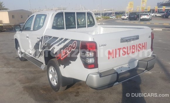 Buy Import Mitsubishi L200 White Car in Import - Dubai in Arusha Buy Import Mitsubishi L200 White Car in Import - Dubai in Arusha