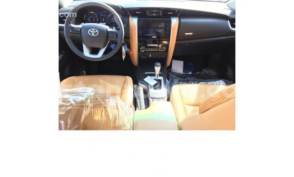 Buy Import Toyota Fortuner White Car in Import - Dubai in Arusha Buy Import Toyota Fortuner White Car in Import - Dubai in Arusha