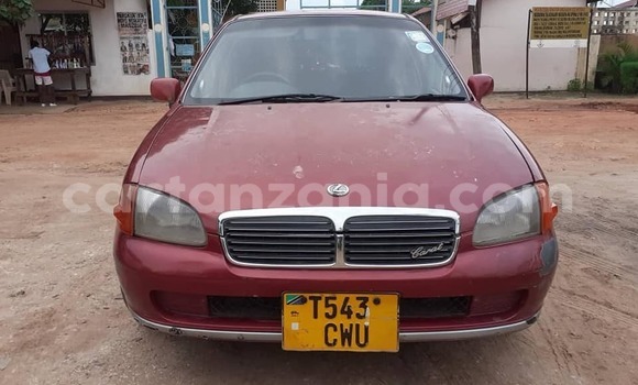 Buy Used Toyota Starlet Red Car in Dar es Salaam in Dar es Salaam