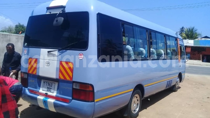 Buy used toyota coaster white car in dar es salaam in dar es