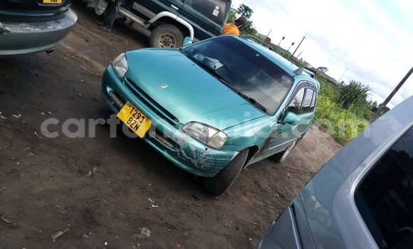 Buy Used Toyota Starlet Green Car in Dar es Salaam in Dar es Salaam