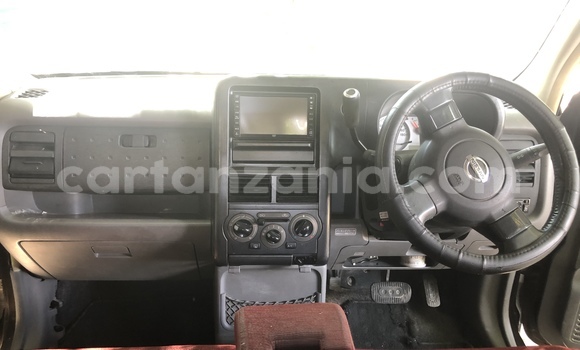 Nunua Ilio tumika Nissan Cube Brown Gari ndani ya Dar es Salaam nchini Dar es Salaam