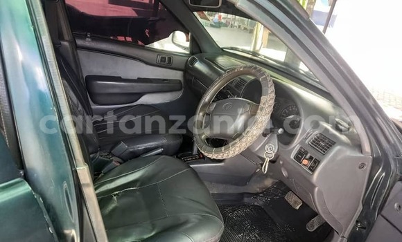 Buy Used Toyota Starlet Green Car in Dar es Salaam in Dar es Salaam Buy Used Toyota Starlet Green Car in Dar es Salaam in Dar es Salaam