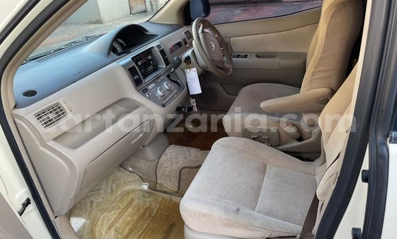 Buy Used Toyota Raum White Car in Dar es Salaam in Dar es Salaam Buy Used Toyota Raum White Car in Dar es Salaam in Dar es Salaam