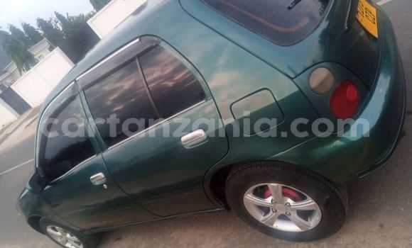 Buy Used Toyota Starlet Green Car in Dar es Salaam in Dar es Salaam