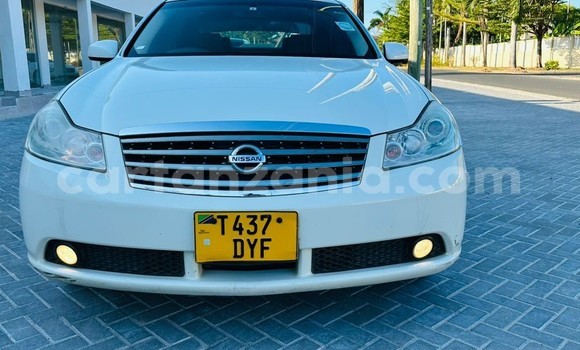 Buy Used Nissan Fuga White Car in Dar es Salaam in Dar es Salaam Buy Used Nissan Fuga White Car in Dar es Salaam in Dar es Salaam