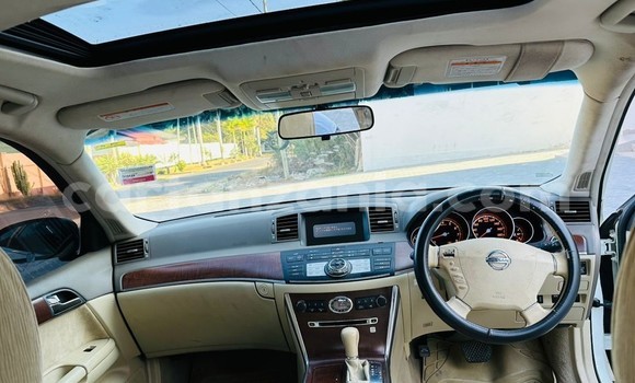 Buy Used Nissan Fuga White Car in Dar es Salaam in Dar es Salaam Buy Used Nissan Fuga White Car in Dar es Salaam in Dar es Salaam