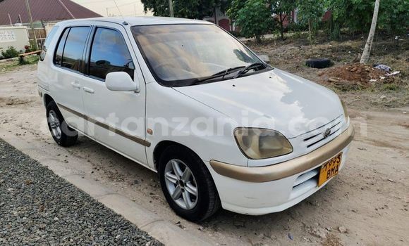 Buy Used Toyota Raum White Car in Dar es Salaam in Dar es Salaam Buy Used Toyota Raum White Car in Dar es Salaam in Dar es Salaam