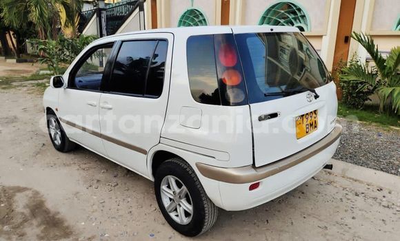Buy Used Toyota Raum White Car in Dar es Salaam in Dar es Salaam Buy Used Toyota Raum White Car in Dar es Salaam in Dar es Salaam