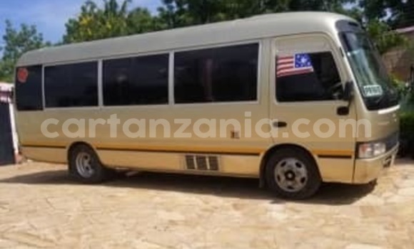Buy Used Toyota Coaster Beige Car in Dar es Salaam in Dar es Salaam Buy Used Toyota Coaster Beige Car in Dar es Salaam in Dar es Salaam
