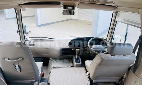 Buy Used Toyota Coaster White Car in Dar es Salaam in Dar es Salaam Buy Used Toyota Coaster White Car in Dar es Salaam in Dar es Salaam