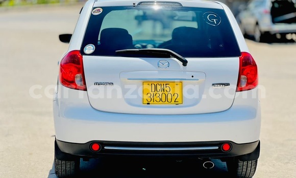 Buy Import Mazda Verisa White Car in Dar es Salaam in Dar es Salaam Buy Import Mazda Verisa White Car in Dar es Salaam in Dar es Salaam