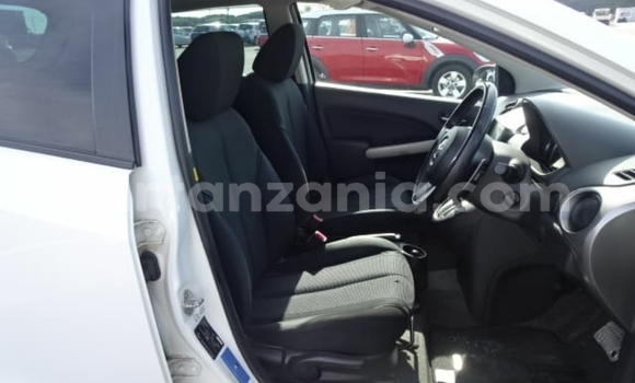 Buy Import Mazda Demio White Car in Dar es Salaam in Dar es Salaam Buy Import Mazda Demio White Car in Dar es Salaam in Dar es Salaam