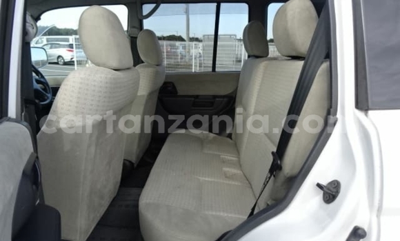 Buy Import Mitsubishi Pajero iO White Car in Dar es Salaam in Dar es Salaam Buy Import Mitsubishi Pajero iO White Car in Dar es Salaam in Dar es Salaam
