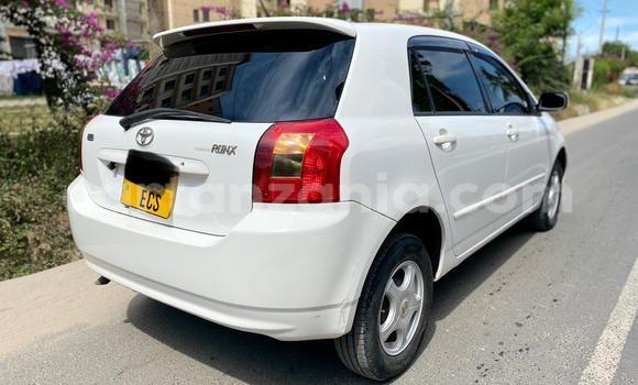 Buy Used Toyota Runx White Car in Dar es Salaam in Dar es Salaam Buy Used Toyota Runx White Car in Dar es Salaam in Dar es Salaam