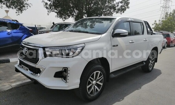 Buy Used Toyota Hilux White Car in Dar es Salaam in Dar es Salaam