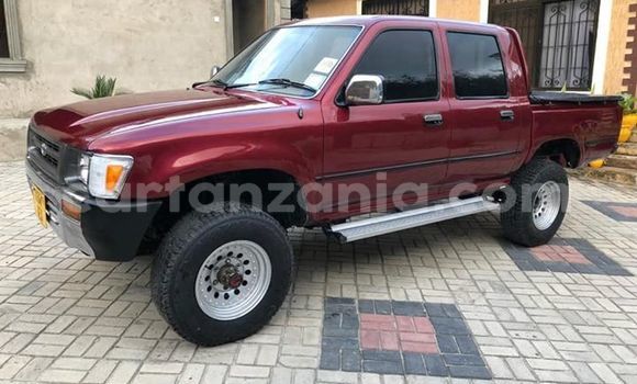 Buy Used Toyota Hilux Red Car in Dar es Salaam in Dar es Salaam Buy Used Toyota Hilux Red Car in Dar es Salaam in Dar es Salaam