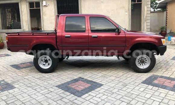 Buy Used Toyota Hilux Red Car in Dar es Salaam in Dar es Salaam Buy Used Toyota Hilux Red Car in Dar es Salaam in Dar es Salaam
