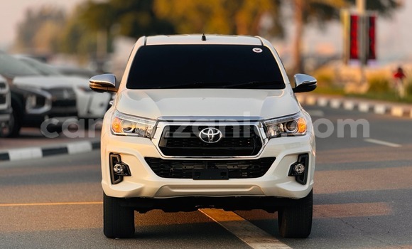 Buy Import Toyota Hiluxe Revo White Car in Dar es Salaam in Dar es Salaam