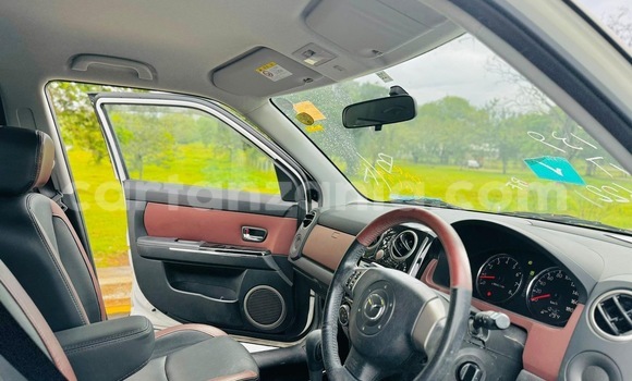 Buy Import Mazda Verisa White Car in Dar es Salaam in Dar es Salaam Buy Import Mazda Verisa White Car in Dar es Salaam in Dar es Salaam