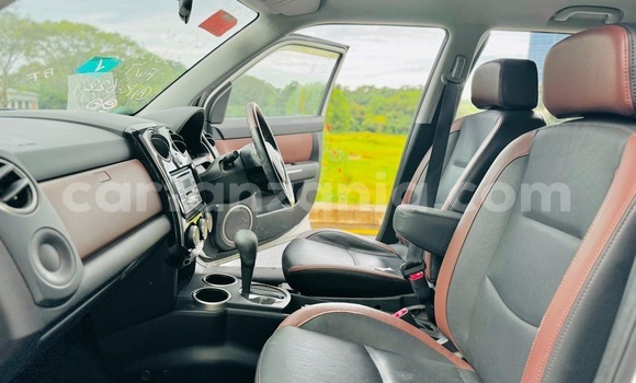 Buy Import Mazda Verisa White Car in Dar es Salaam in Dar es Salaam Buy Import Mazda Verisa White Car in Dar es Salaam in Dar es Salaam