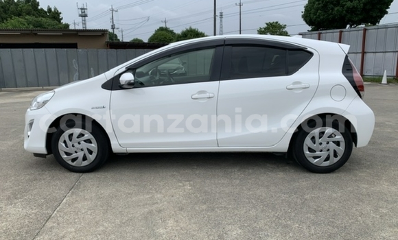 Buy Import Toyota Aqua White Car in Dar es Salaam in Dar es Salaam Buy Import Toyota Aqua White Car in Dar es Salaam in Dar es Salaam