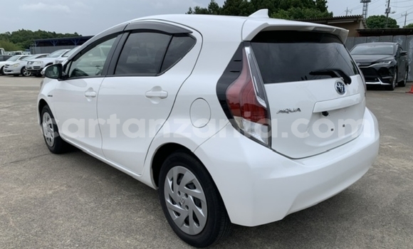 Buy Import Toyota Aqua White Car in Dar es Salaam in Dar es Salaam Buy Import Toyota Aqua White Car in Dar es Salaam in Dar es Salaam