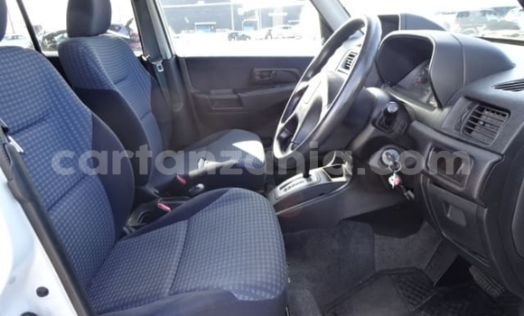 Buy Import Mitsubishi Pajero iO White Car in Dar es Salaam in Dar es Salaam Buy Import Mitsubishi Pajero iO White Car in Dar es Salaam in Dar es Salaam