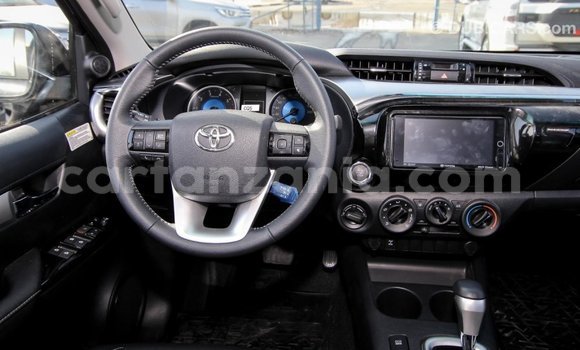 Nunua Imported Toyota Hilux Nyeusi Gari ndani ya Import - Dubai nchini Arusha Nunua Imported Toyota Hilux Nyeusi Gari ndani ya Import - Dubai nchini Arusha
