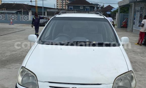 Buy Used Toyota Raum White Car in Dar es Salaam in Dar es Salaam Buy Used Toyota Raum White Car in Dar es Salaam in Dar es Salaam