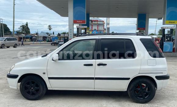 Buy Used Toyota Raum White Car in Dar es Salaam in Dar es Salaam Buy Used Toyota Raum White Car in Dar es Salaam in Dar es Salaam