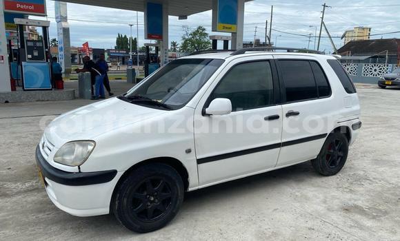 Buy Used Toyota Raum White Car in Dar es Salaam in Dar es Salaam Buy Used Toyota Raum White Car in Dar es Salaam in Dar es Salaam
