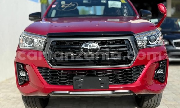 Nunua Imported Toyota Hilux Nyekundu Gari ndani ya Dar es Salaam nchini Dar es Salaam