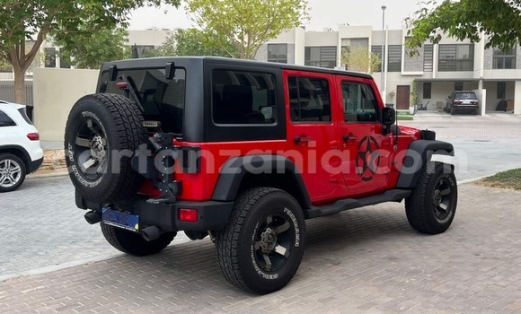 Buy Used Jeep Wrangler Red Car in Dar es Salaam in Dar es Salaam Buy Used Jeep Wrangler Red Car in Dar es Salaam in Dar es Salaam