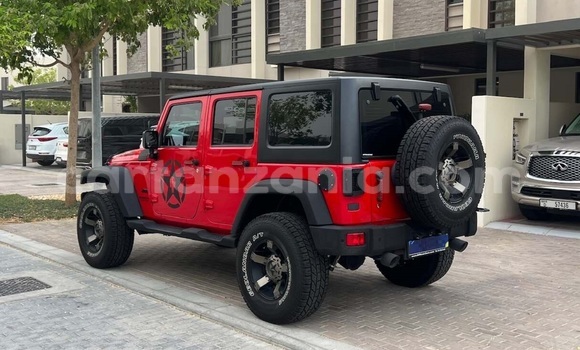 Buy Used Jeep Wrangler Red Car in Dar es Salaam in Dar es Salaam Buy Used Jeep Wrangler Red Car in Dar es Salaam in Dar es Salaam