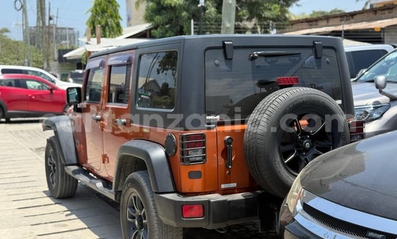 Buy Used Jeep Wrangler Red Car in Dar es Salaam in Dar es Salaam Buy Used Jeep Wrangler Red Car in Dar es Salaam in Dar es Salaam