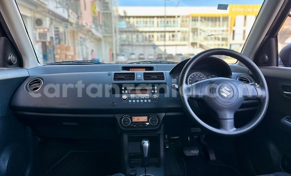 Buy Import Suzuki Swift Red Car in Dar es Salaam in Dar es Salaam Buy Import Suzuki Swift Red Car in Dar es Salaam in Dar es Salaam