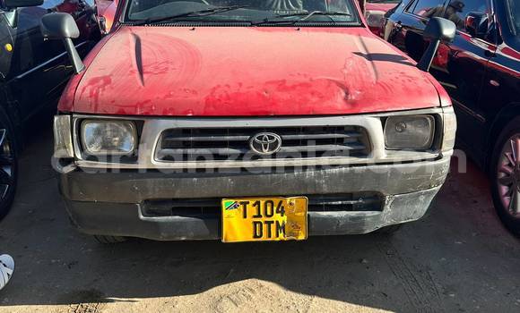 Buy Used Toyota Hilux Red Car in Dar es Salaam in Dar es Salaam