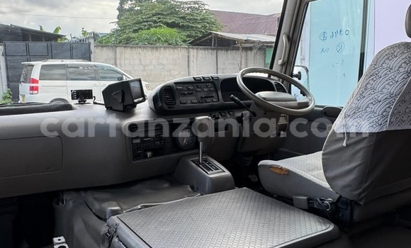 Buy Import Toyota Coaster White Car in Dar es Salaam in Dar es Salaam Buy Import Toyota Coaster White Car in Dar es Salaam in Dar es Salaam