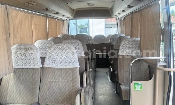 Buy Import Toyota Coaster White Car in Dar es Salaam in Dar es Salaam Buy Import Toyota Coaster White Car in Dar es Salaam in Dar es Salaam