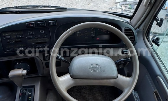 Buy Import Toyota Coaster White Car in Dar es Salaam in Dar es Salaam Buy Import Toyota Coaster White Car in Dar es Salaam in Dar es Salaam