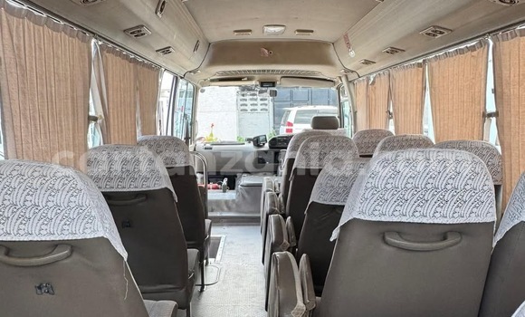 Buy Import Toyota Coaster White Car in Dar es Salaam in Dar es Salaam Buy Import Toyota Coaster White Car in Dar es Salaam in Dar es Salaam