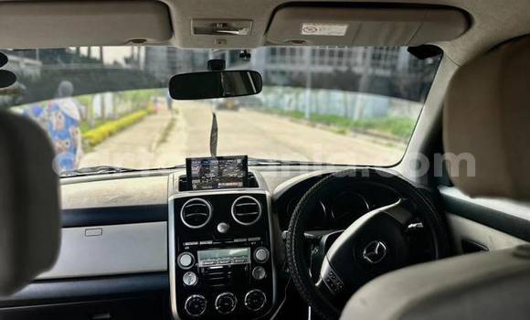 Buy Used Mazda Verisa White Car in Dar es Salaam in Dar es Salaam Buy Used Mazda Verisa White Car in Dar es Salaam in Dar es Salaam