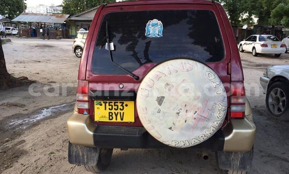 Buy Used Mitsubishi Pajero Junior Red Car in Dar es Salaam in Dar es Salaam Buy Used Mitsubishi Pajero Junior Red Car in Dar es Salaam in Dar es Salaam