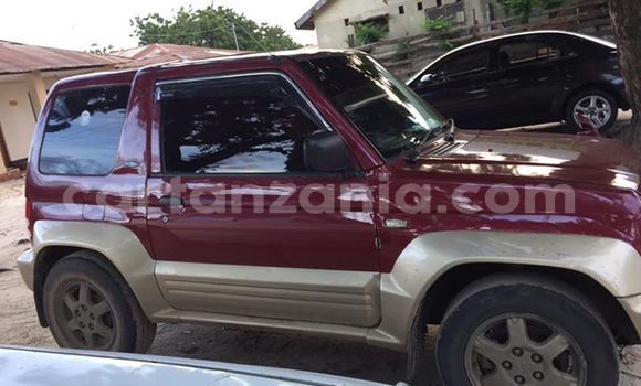 Buy Used Mitsubishi Pajero Junior Red Car in Dar es Salaam in Dar es Salaam Buy Used Mitsubishi Pajero Junior Red Car in Dar es Salaam in Dar es Salaam