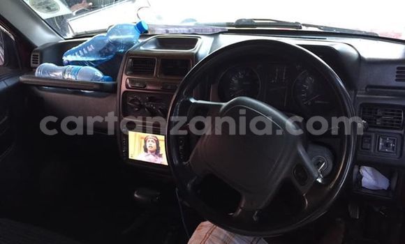 Buy Used Mitsubishi Pajero Junior Red Car in Dar es Salaam in Dar es Salaam Buy Used Mitsubishi Pajero Junior Red Car in Dar es Salaam in Dar es Salaam