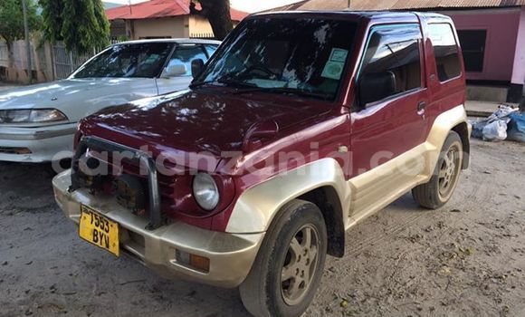 Buy Used Mitsubishi Pajero Junior Red Car in Dar es Salaam in Dar es Salaam Buy Used Mitsubishi Pajero Junior Red Car in Dar es Salaam in Dar es Salaam