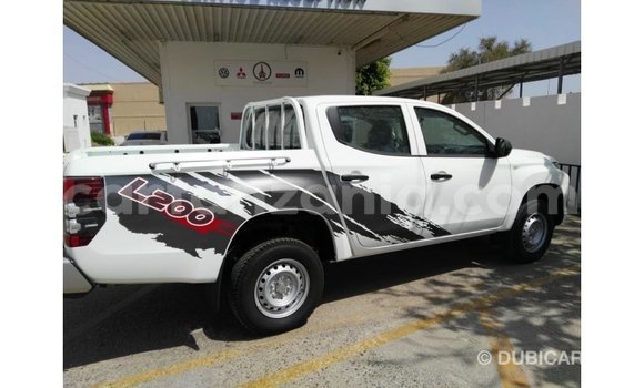 Buy Import Mitsubishi L200 White Car in Import - Dubai in Arusha Buy Import Mitsubishi L200 White Car in Import - Dubai in Arusha