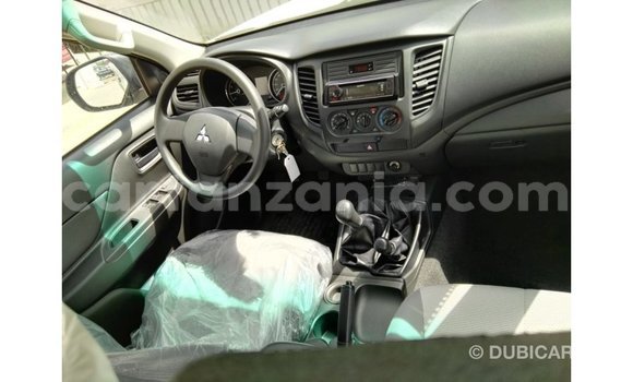 Buy Import Mitsubishi L200 White Car in Import - Dubai in Arusha Buy Import Mitsubishi L200 White Car in Import - Dubai in Arusha