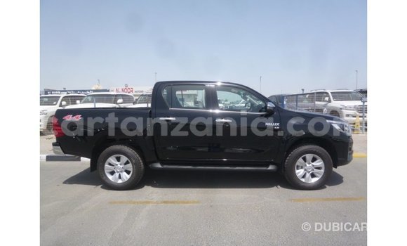 Nunua Imported Toyota Hilux Nyeusi Gari ndani ya Import - Dubai nchini Arusha Nunua Imported Toyota Hilux Nyeusi Gari ndani ya Import - Dubai nchini Arusha